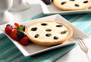 Mini cheesecake con uvas pasas Mini cheesecake con uvas pasas