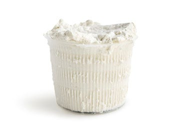 Cuajo para queso en un frasco. Cuajo para queso en un frasco de plástico.