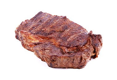 Filete de carne de res asado en parrilla volcánica.