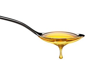 Cucharada de jarabe de panela.