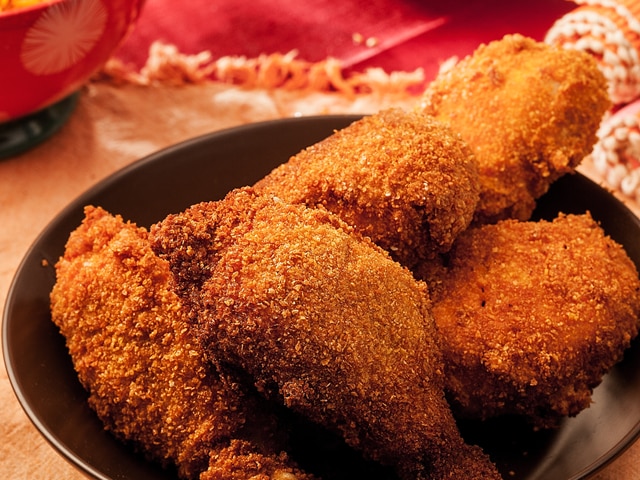 Muslos de pollo apanados