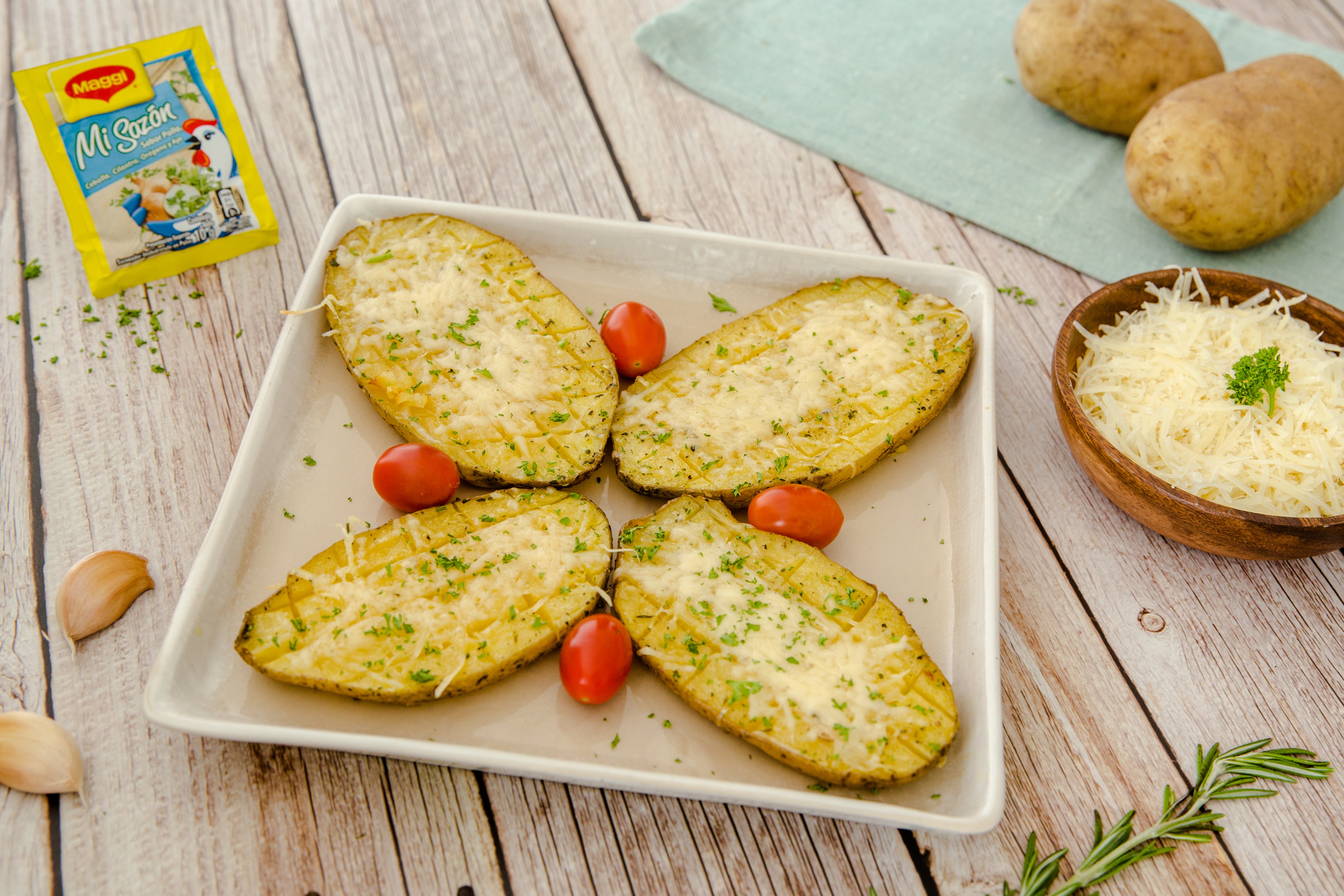 Papas con mantequilla y parmesano gratinadas