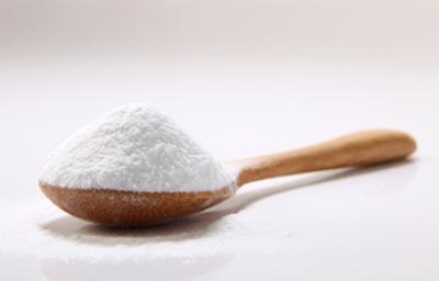 Cuchara con bicarbonato de sodio para cocinar Cuchara con bicarbonato de sodio para cocinar