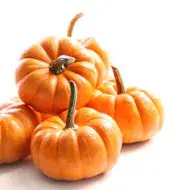 calabaza apilada en una mesa