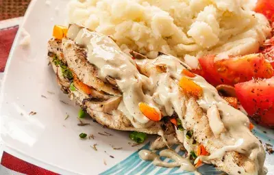 Corvina rellena con champiñones Corvina rellena con champiñones