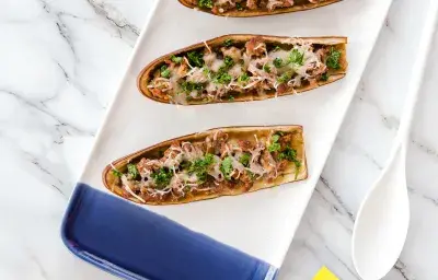 Berenjenas rellenas de Boloñesa Berenjenas rellenas de Boloñesa