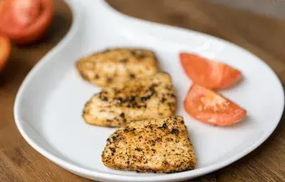 Tilapia con Tomate Asado Tilapia con Tomate Asado