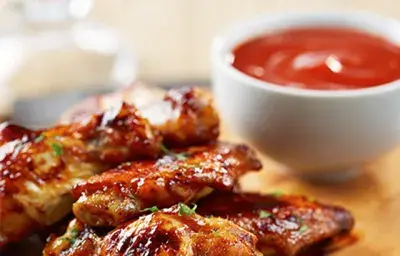 Alitas en salsa mediterranea