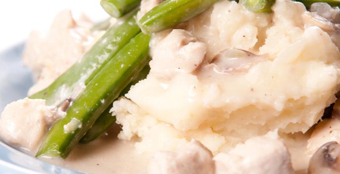 Puré de papas con gravy de hongos