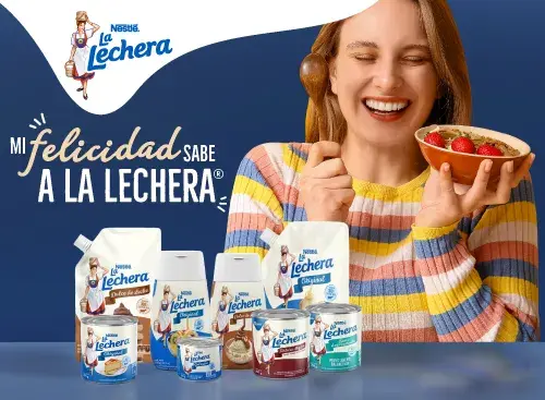 Productos Nestlé La Lechera en presentación variada junto a un bowl con fresas y la frase "Mi felicidad sabe a La Lechera".